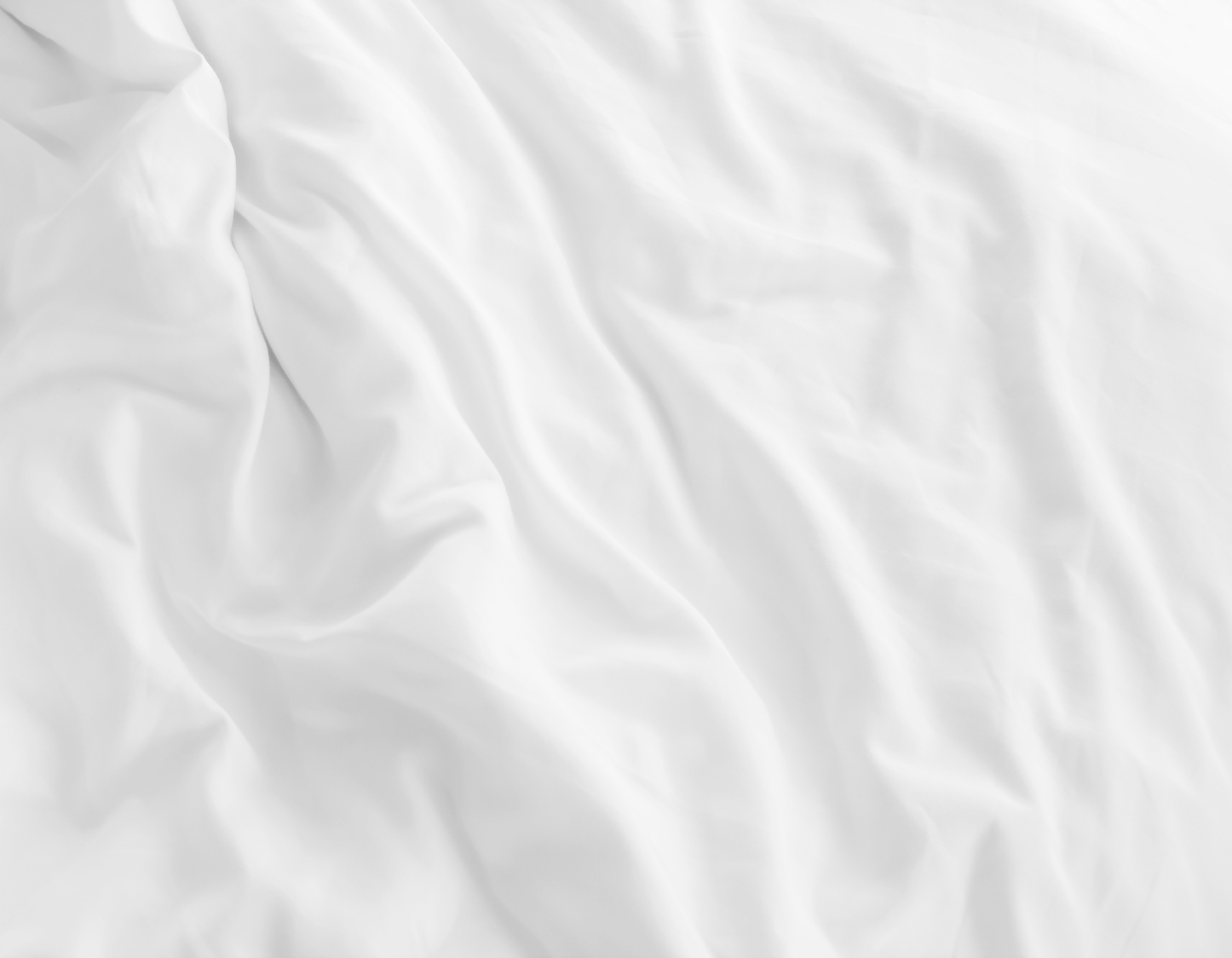 white bed sheets